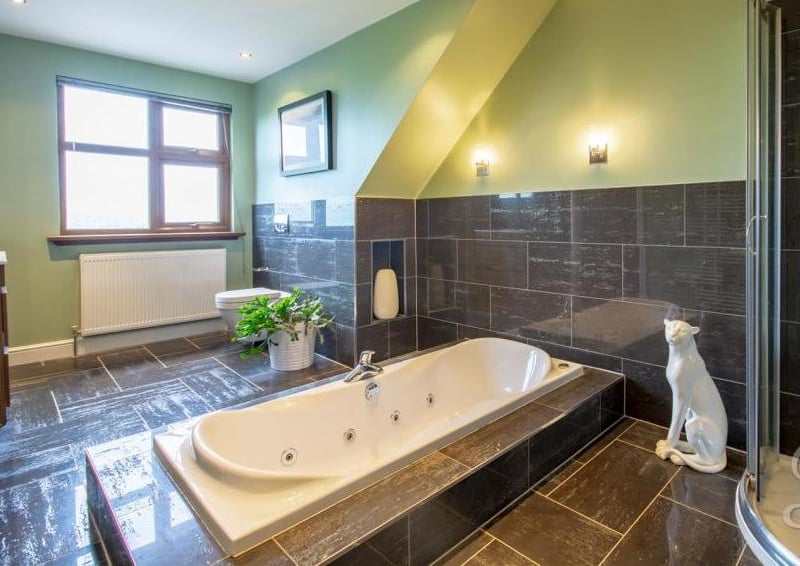 A stylish, spacious bathroom to please even the most demanding of people! Inset bath, enclosed shower, low-flush WC, wash hand basin and a window to the front.