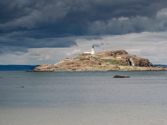 A view of a lighthouse from Yellowcraig Beach, taken by Dorota Markowska.