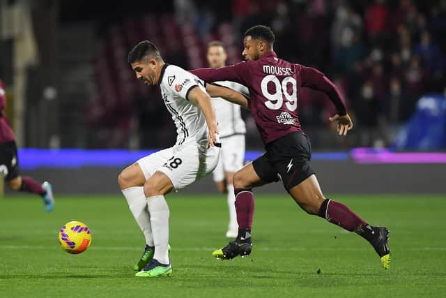 Martin Erlic of Spezia Calcio vies with Lys Mousset of US Salernitana on loan from Sheffield United during the Serie A match between US Salernitana and Spezia Calcio at Stadio Arechi on February 07, 2022 in Salerno, Italy. (Photo by Francesco Pecoraro/Getty Images)