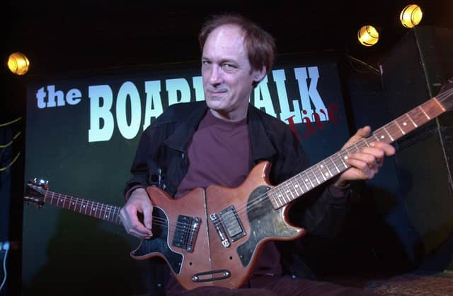 The ever-eccentric John Otway with his double guitar at The Boardwalk in 2002