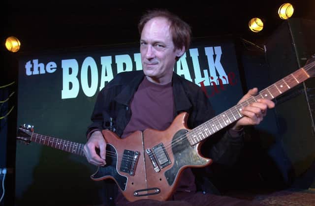 The ever-eccentric John Otway with his double guitar at The Boardwalk in 2002