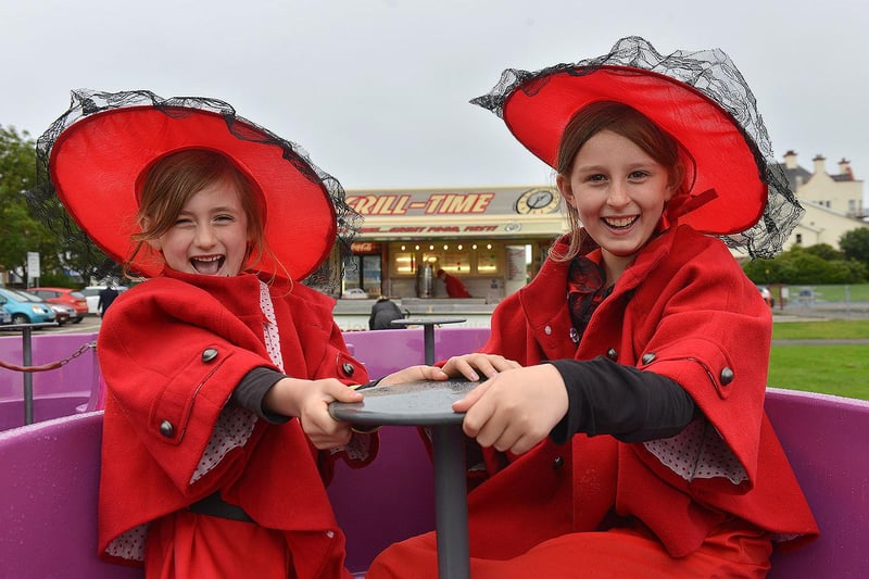 Sisters Sophie (left) and Grace Measor enjoying the Tea Pot ride during the Victorian Festival in 205.