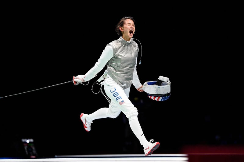 Lee Kiefer of Team United States celebrates after winning the Women's Foil Individual Fencing semifinal