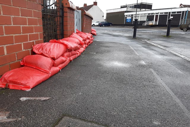 Bright red sandbags at the corner of Yarborough Terrace in Bentley, near the ambulance station