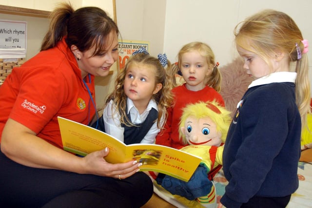 Teacher Rachel Sykes reads to three-year-olds at Millfield Nursery in 2007. Can you spot anyone you know?