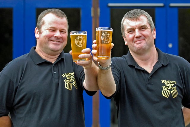 Mike Betts (45) and Dave Martin (44) orgainsers of the Wickham Beer Festival 2010. Enjoying a pint outside the community centre. Picture: Sarah Standing (102856-54)