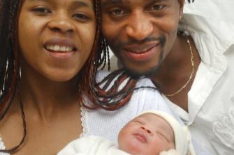 Queeneth Suntsha and Godfrey Pambalipe with their new born daughter Thandle in 2005.