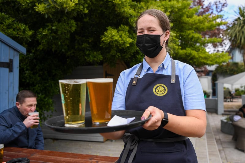 Staff serve drinks at Brewhouse and Kitchen pub at Southsea. Picture: Finnbarr Webster/Getty Images
