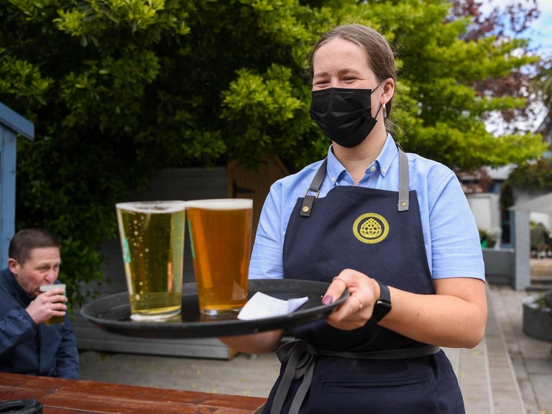 Staff serve drinks at Brewhouse and Kitchen pub at Southsea. Picture: Finnbarr Webster/Getty Images