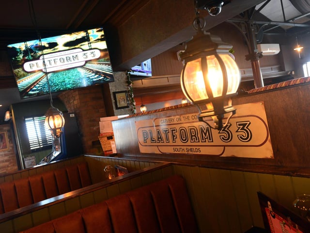 The pub has kept the railway carriage theme.