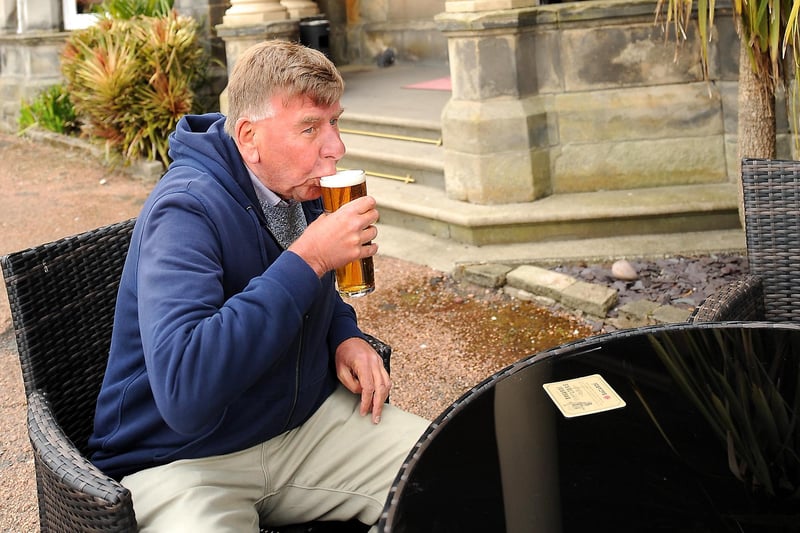 Enjoying a welcome pint outdoors at the Strathearn Hotel is Dennis Tracey (Pic: Fife Photo Agency)
