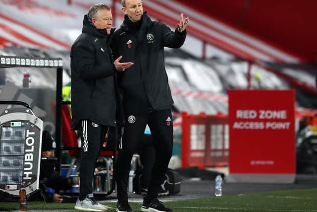 Sheffield United manager Chris Wilder (L) and his assistant Alan Knill discuss strategy on the touchline: Simon Bellis/Sportimage