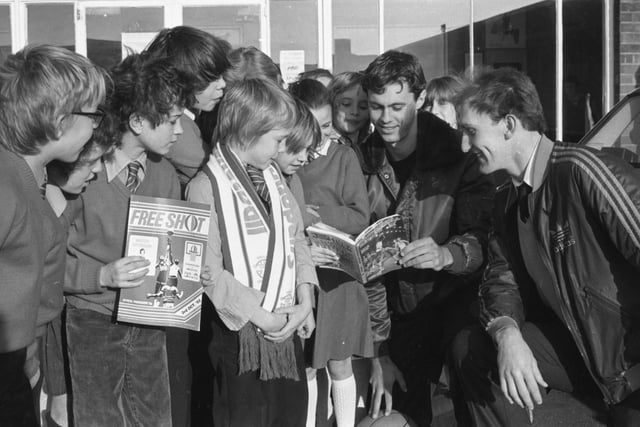 Sunderland basketball players Randy Haefner, centre, and Colin Kirkham, right, were at Red House Primary School to see some of the children who wrote to thank the two players for the sports clinic they organised for them. Are you one of the pupils pictured in 1982?