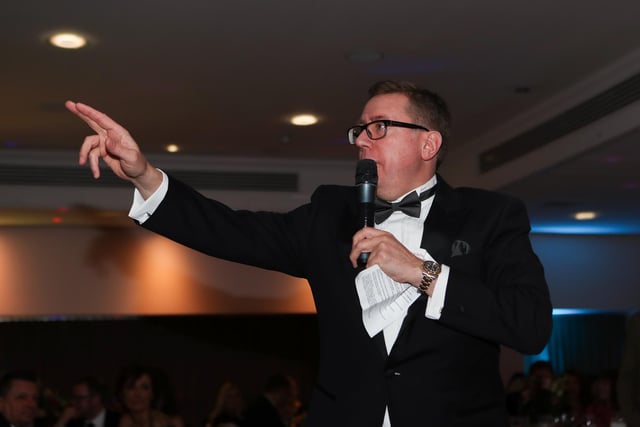 Auctioneer David Tate chairing the auction which raised over £7,000