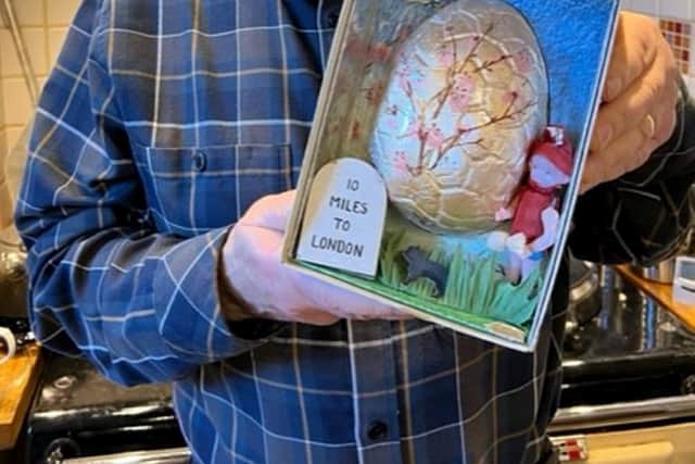 Martin Bennett, 75, now owns the 83-year-old Easter Egg that's been passed down through his family. See SWNS story SWSMegg. A family has proudly displayed the world's oldest chocolate Easter egg for the 83rd year in a row. The foil wrapped egg was given to Alice Bennett by her son Frank Bennett in March 1940, as a present to commemorate him joining the army during World War II. She said it was "too nice" to eat - and instead proudly displayed it in her lounge every Easter - a tradition carried on by Frank, and now his son Martin, 75.