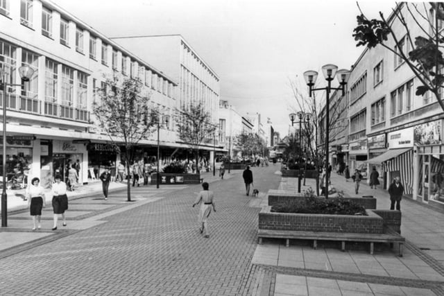 The Moor, Sheffield city centre, in 1983, showing shops including the clothing store Etam, on the left.