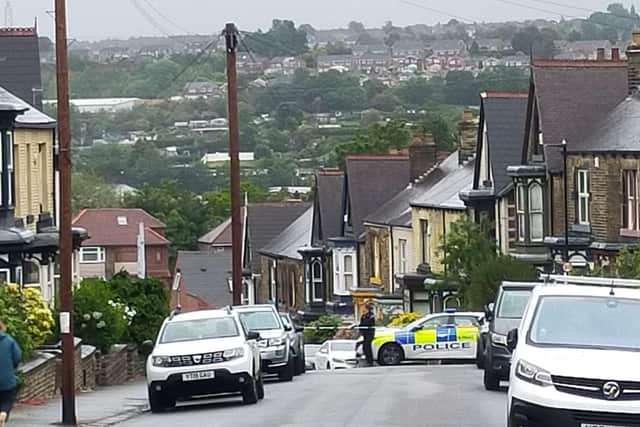The road has been taped for nearly 24 hours since officers arrived at around midday on May 30 to find a dead body in the two-storey home.