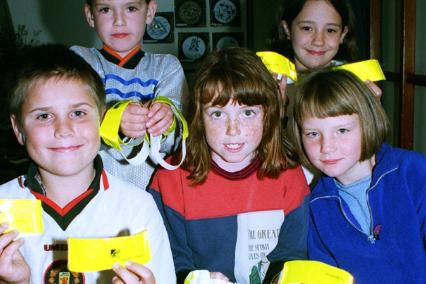 Children at Anchorage school with reflective armbands donated from the Coop Funeral Service in 1998.