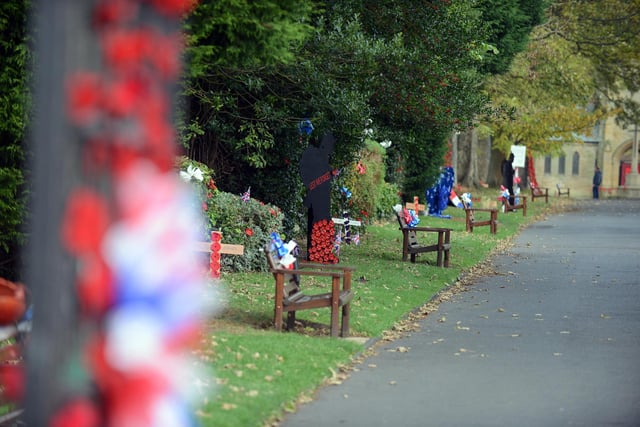 The cemetery's benches have been decorated