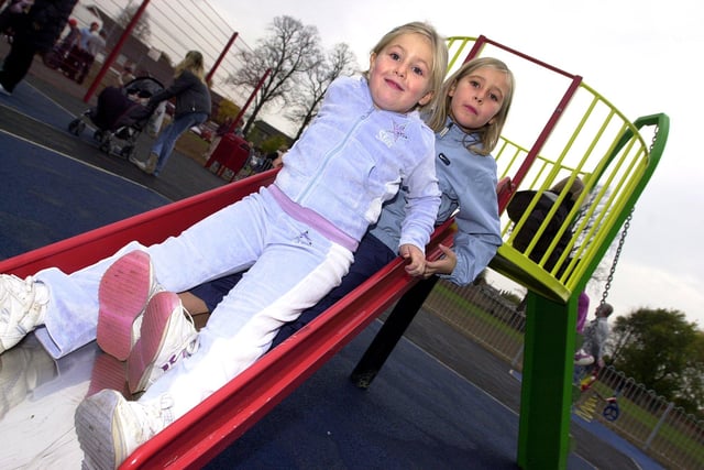 Sisters Ellie-Anne and Abbey Teale, aged five, and eight, had fun at the new children's play area in Tickhill in 2003