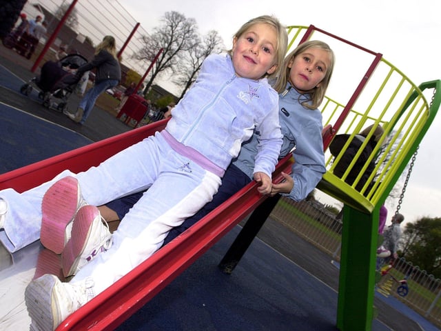 Sisters Ellie-Anne and Abbey Teale, aged five, and eight, had fun at the new children's play area in Tickhill in 2003