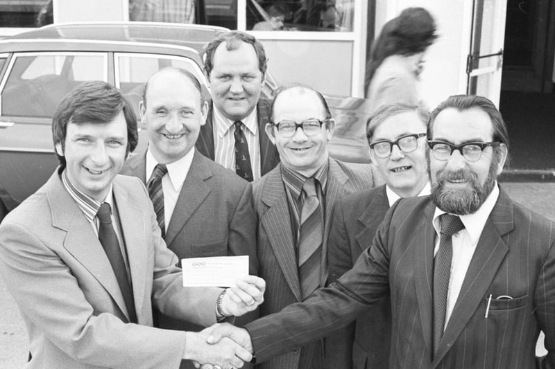 George Semens (right) chairman of the Wearmouth Colliery Mechanics' Association, presents a cheque for £536 to Mr John Bowskill, Sector Adminstrator at Sunderland District Hospital, for funds to go towards an operating microscope.