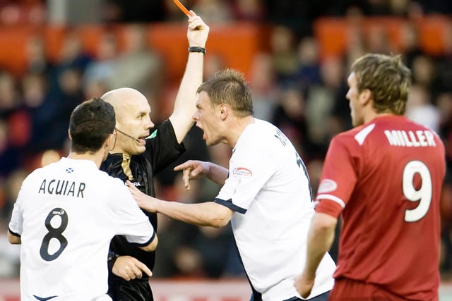 Stephen Finnie shows Zaliukas a red card in a late-season game at Aberdeen. It would be the defender's fourth red card of the campaign.