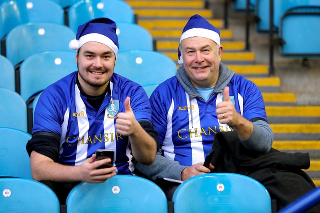 Wednesday fans with their Santa hats on in December 2019.