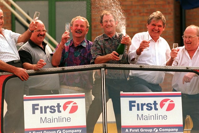 Pictured celebrating their National Lottery win in April 1999 are a six-strong syndicate from the Sheffield Transport Sports & Social Club at Meadowhead, Sheffield on top of an open-top Mainline bus. Pictured left to right are Filip Carpino, Graham Sanderson, Joe Angell, Derek Moore, David Bingham and Jack Whitehead