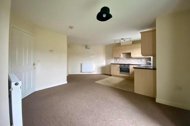 As you walk in to the apartment via the entrance hall, first impressions are sure to be positive. You meet the open-plan lounge/kitchen, which is bright and spacious.