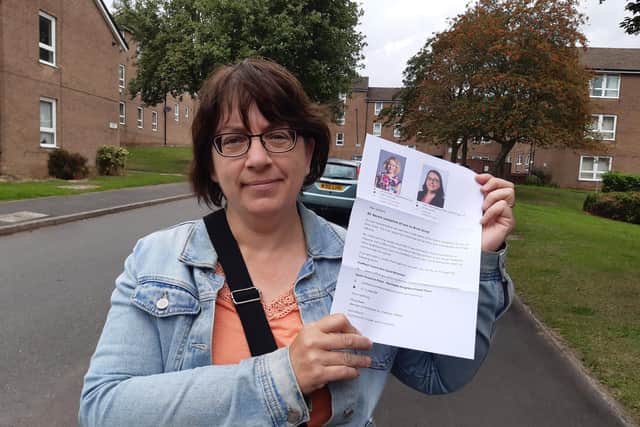Coun Ruth Milsom with one of the leaflets distributed on Brick Street