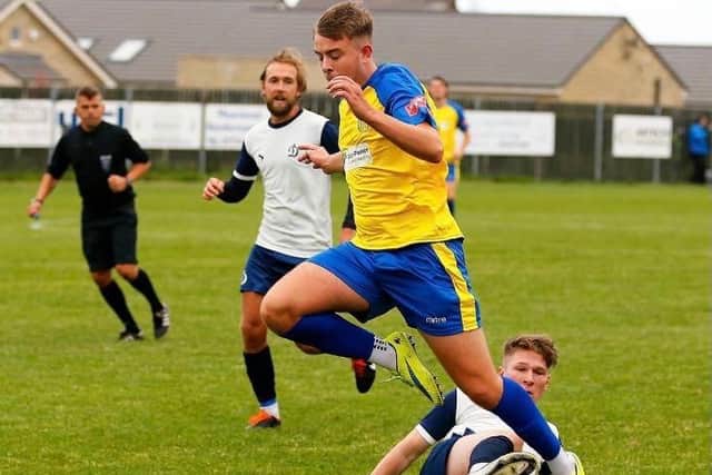 Youngster Lewis Witham in action for Stocksbridge Park Steels.