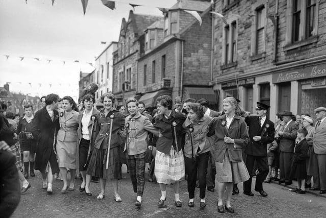 Selkirk Common Riding, June 1959. A group of young girls take part in a procession through the streets.