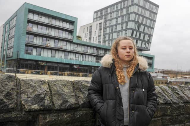 Resident Jenni Garrett outside The Wicker Riverside building on Northside in Sheffield which failed a recent fire safety check.
