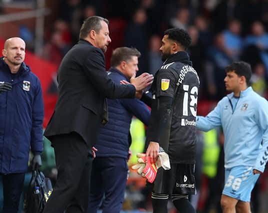 Slavisa Jokanovic manager of Sheffield United greets Wes Foderingham after the draw with Coventry City: Simon Bellis / Sportimage