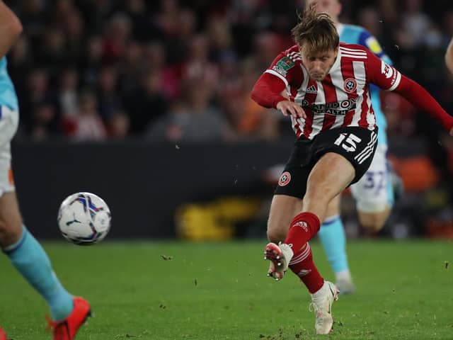 Luke Freeman of Sheffield United shoots against Derby in the Carabao Cup: Alistair Langham / Sportimage