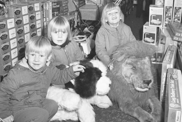These youngsters looked like they were having a wonderful time in the store in October 1977. Does this bring back happy memories?