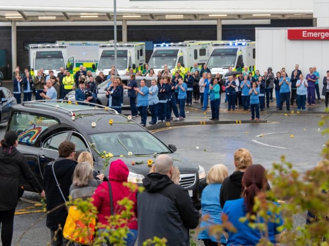 Dozens of nurses and other hospital staff came out to pay their respects on Thursday.