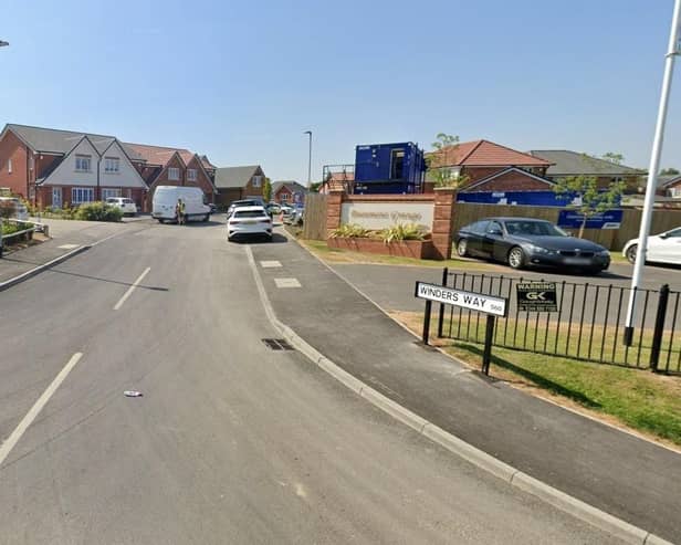 Jones Homes has agreed to move a memorial pit wheel back to face visitors entering the village after it was moved during the construction of 94 houses off Wood Lane.