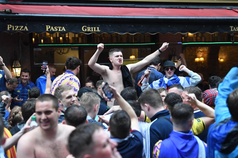 Apparently it is 'taps aff' weather in London as some Scottish fans demonstrate (Photo: Stefan Rousseau/PA Wire).