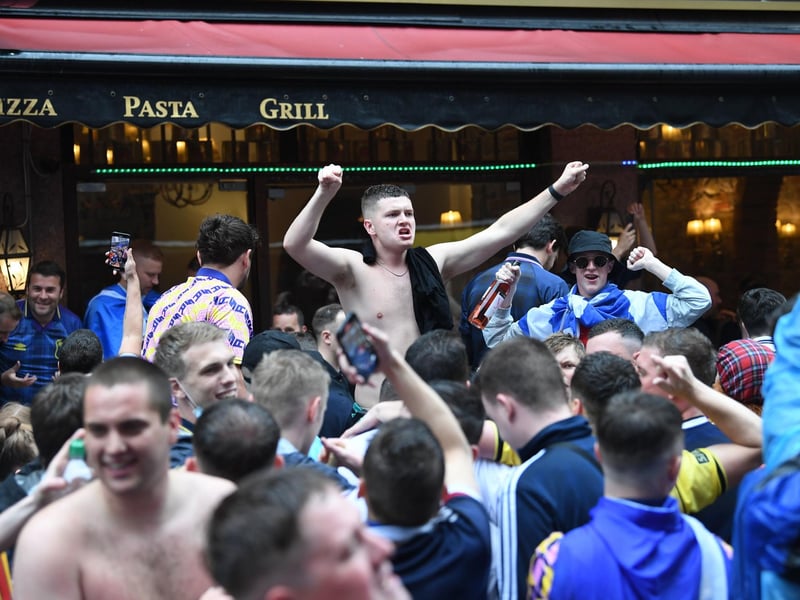Apparently it is 'taps aff' weather in London as some Scottish fans demonstrate (Photo: Stefan Rousseau/PA Wire).
