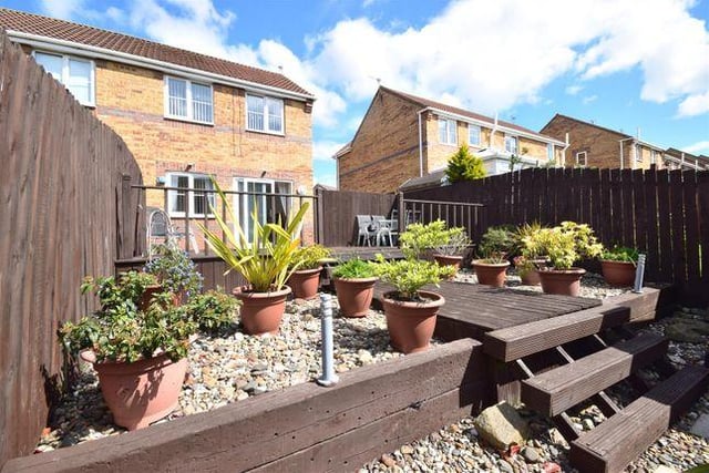 The house features a delightful landscaped garden with decking to the rear.