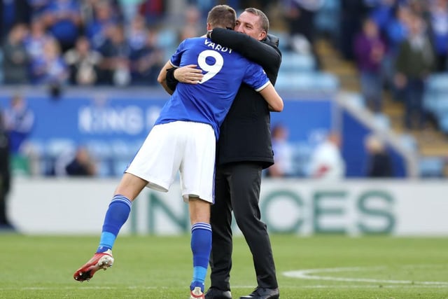 Jamie Vardy of Leicester City embraces Manager Brendan Rogers of Leicester City during the Premier League match between Leicester City and Manchester United at The King Power Stadium on October 16, 2021 in Leicester, England.