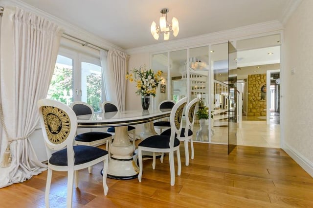 No wonder the temptation is to dine in every night! This delightful room is formal but also convivial, and leads to the well-appointed kitchen.