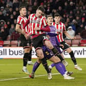 Ciaran Clark heads home for Sheffield United against Coventry City: Andrew Yates / Sportimage