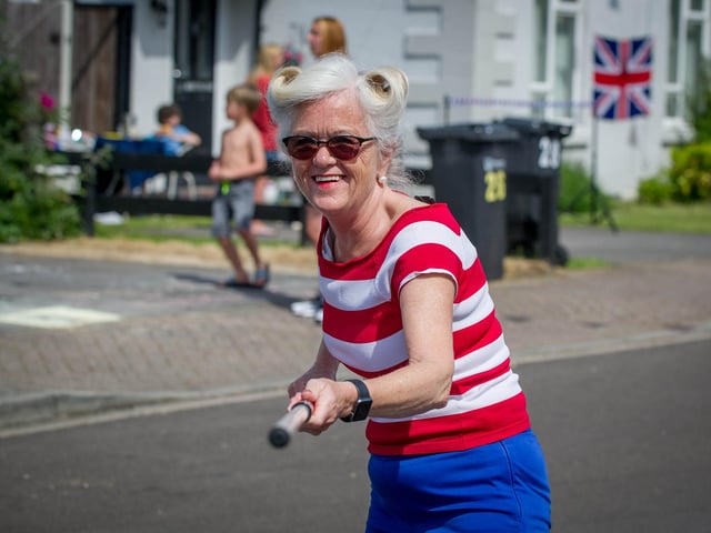 Denise Barlow with her 2 metre social distance stick during the VE Day celebrations in Peronne Road, Portsmouth.