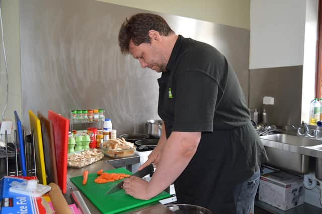 Adrian Colliver at work in the Emmaus Sheffield kitchen