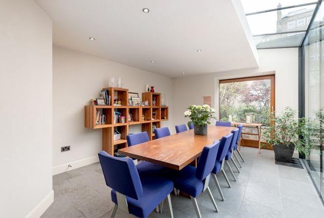 The dining room is large, modern and lets in a lot of light
