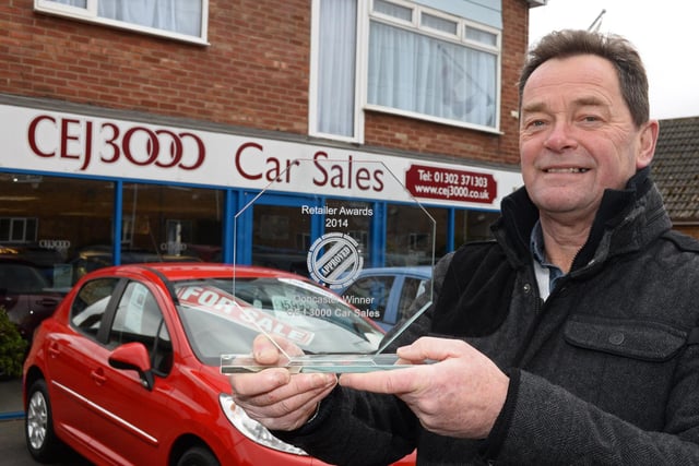 Colin Jones, Director, of CJ3000 car sales, in Branton, pictured with his retailer of the year award in 2015