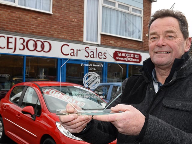 Colin Jones, Director, of CJ3000 car sales, in Branton, pictured with his retailer of the year award in 2015